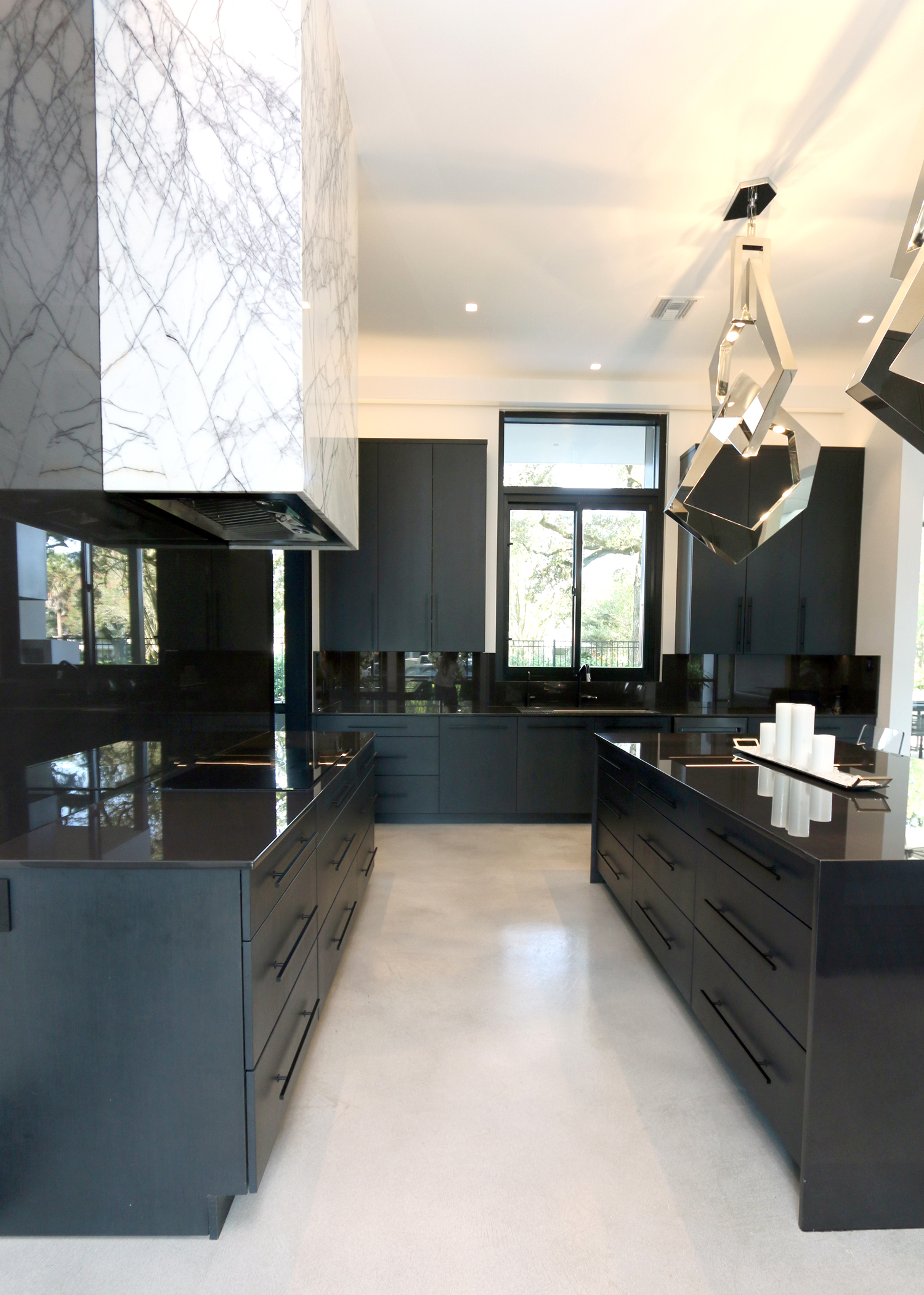 kitchen with custom black cabinets