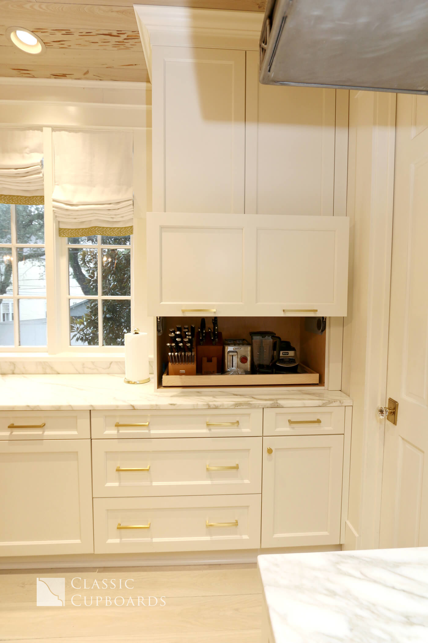transitional style cabinets with hidden appliance corner
