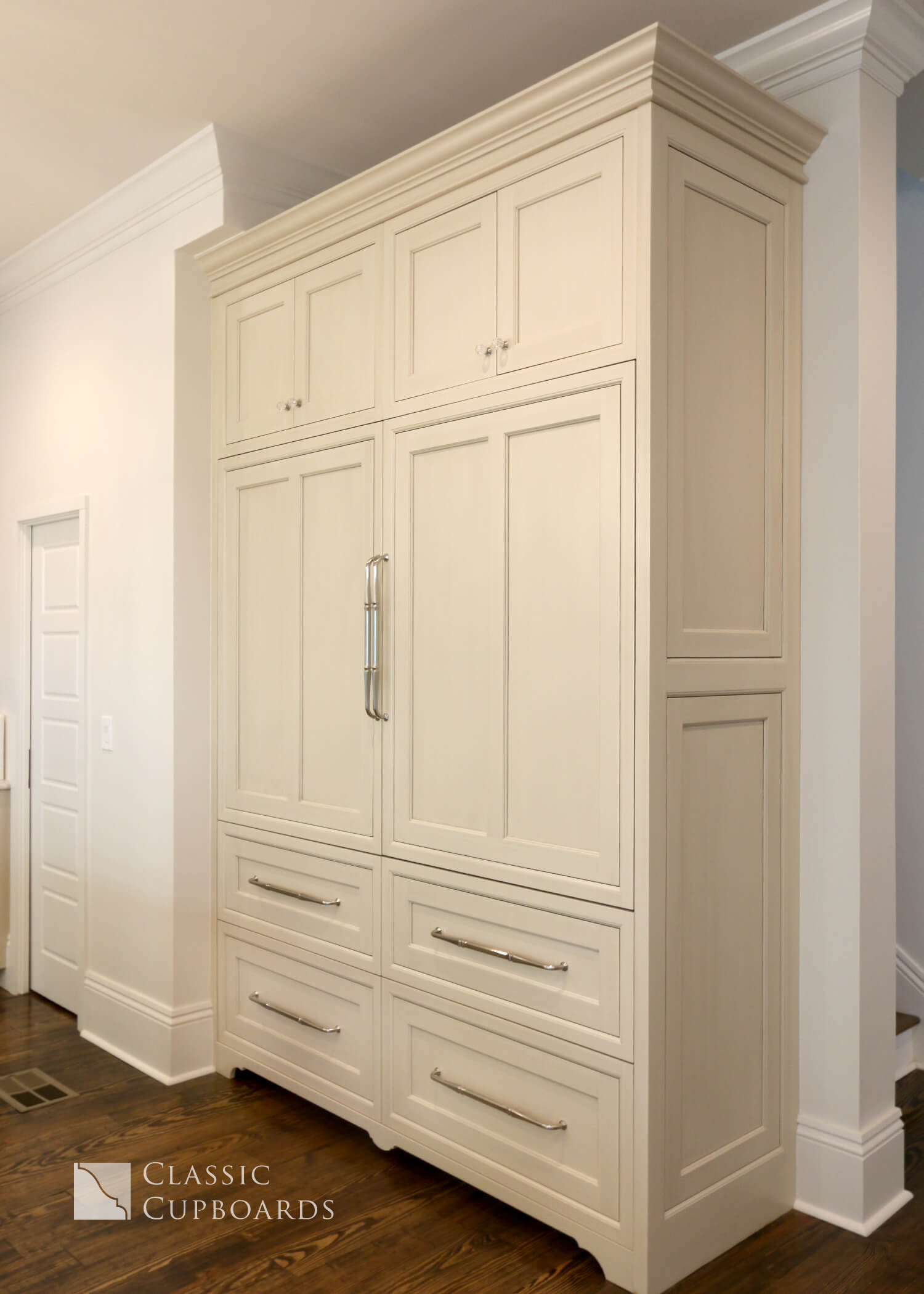 Concealed fridge with traditional cabinetry