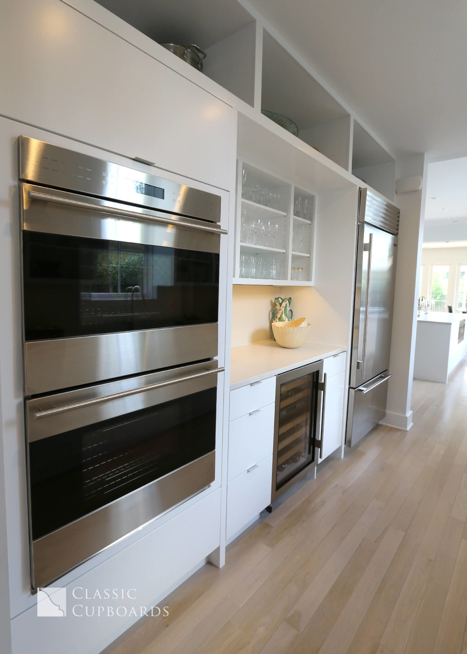 contemporary style kitchen with double ovens
