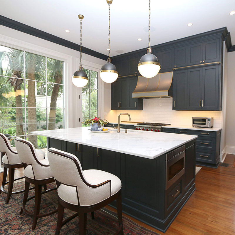 Traditional Kitchen with navy cabinets