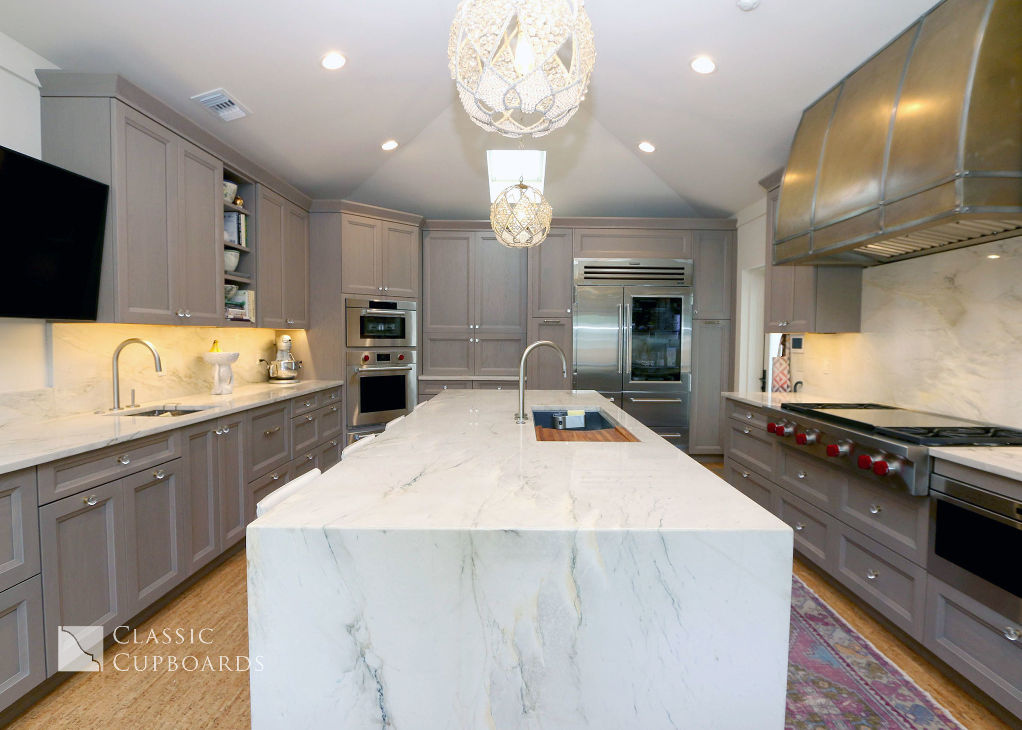 Transitional Kitchen with waterfall island