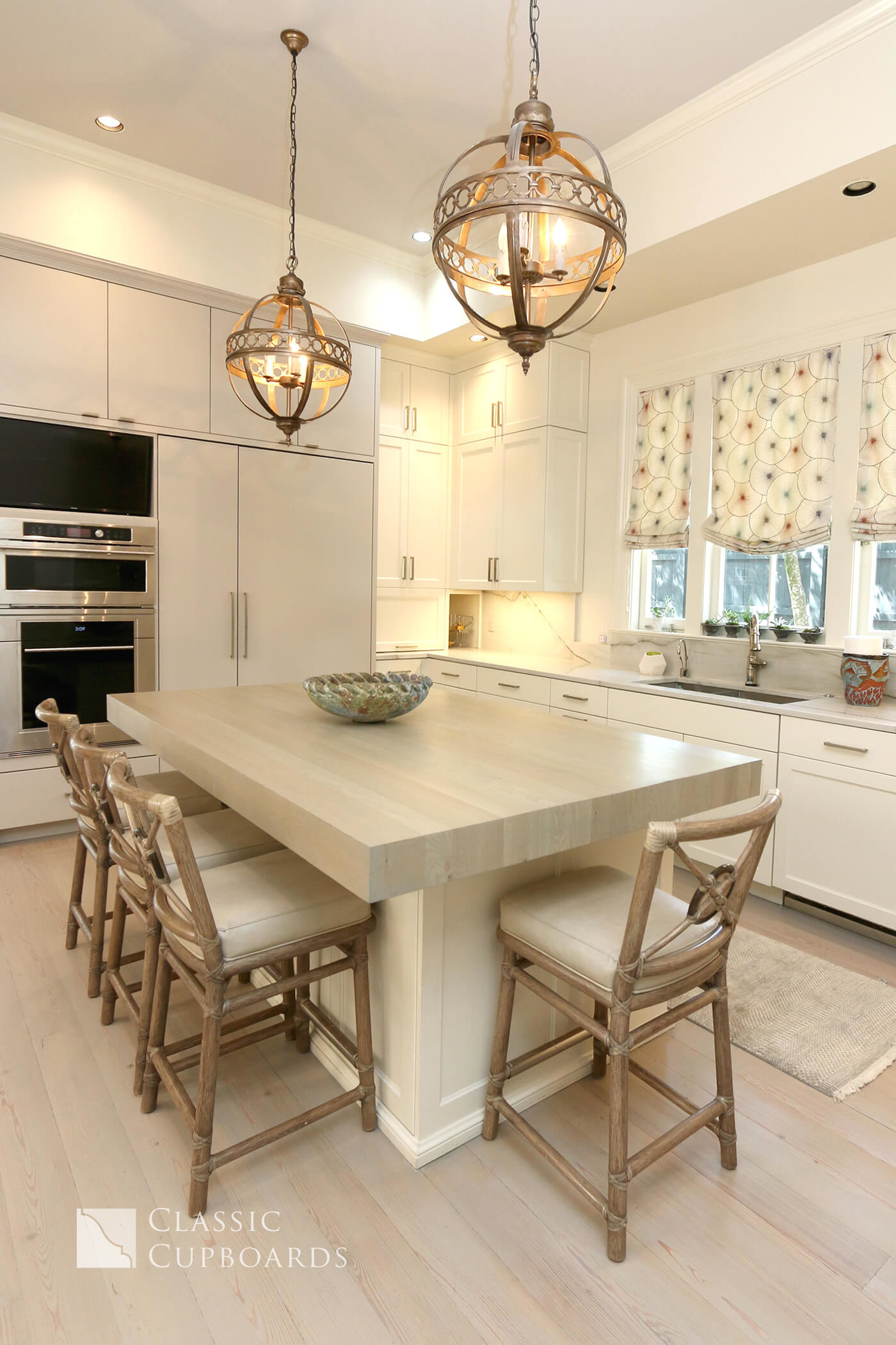 Transitional Kitchen island with thick countertop