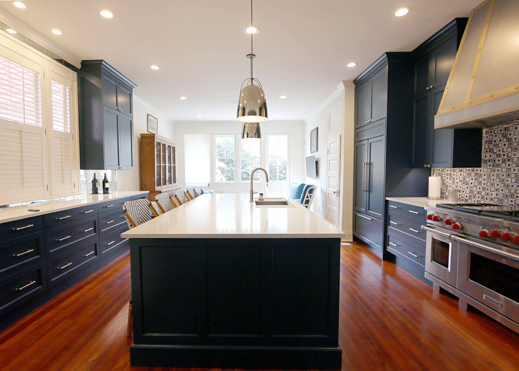 transitional kitchen with custom blue cabinets